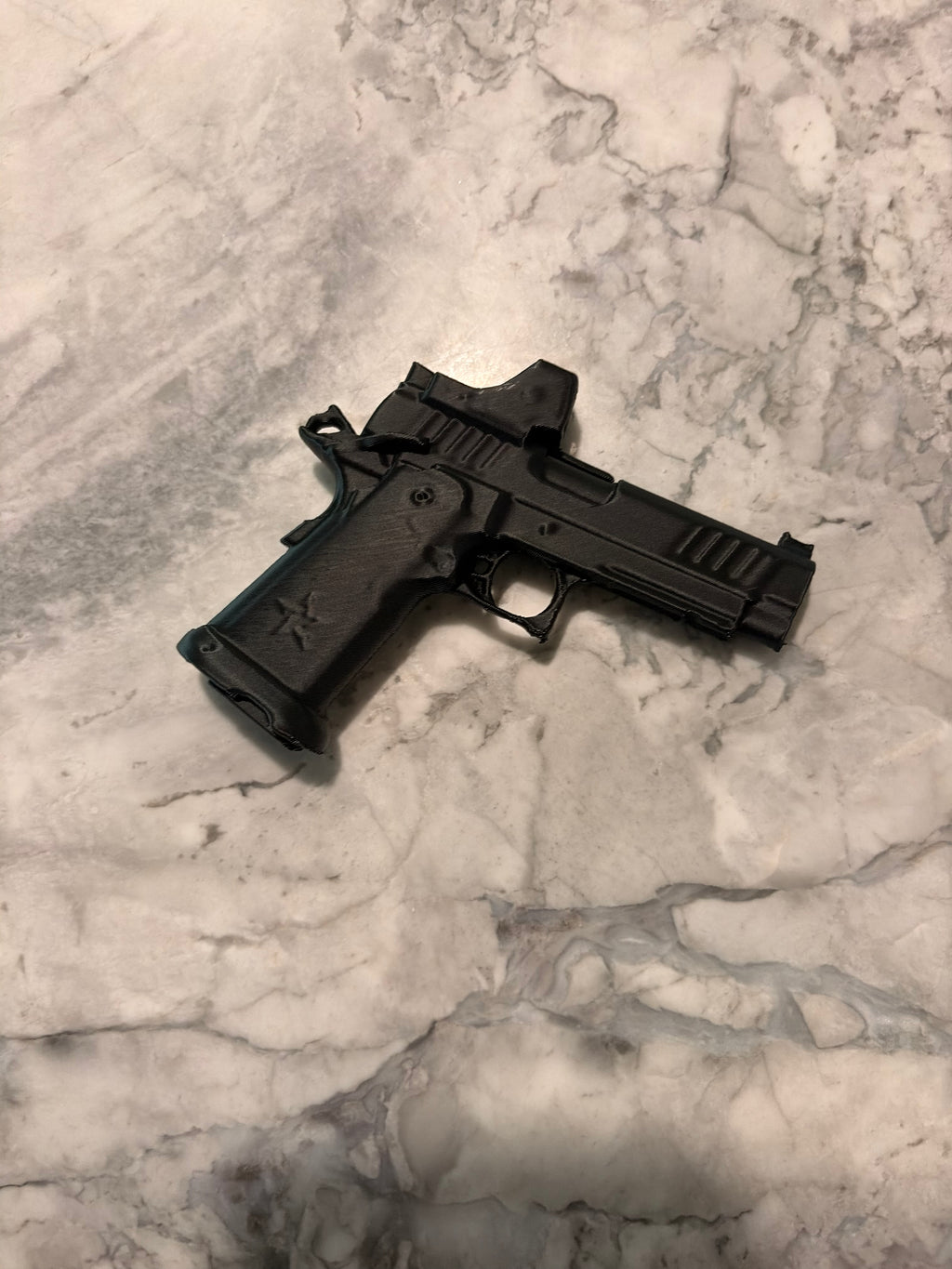 Mini Staccato pistol